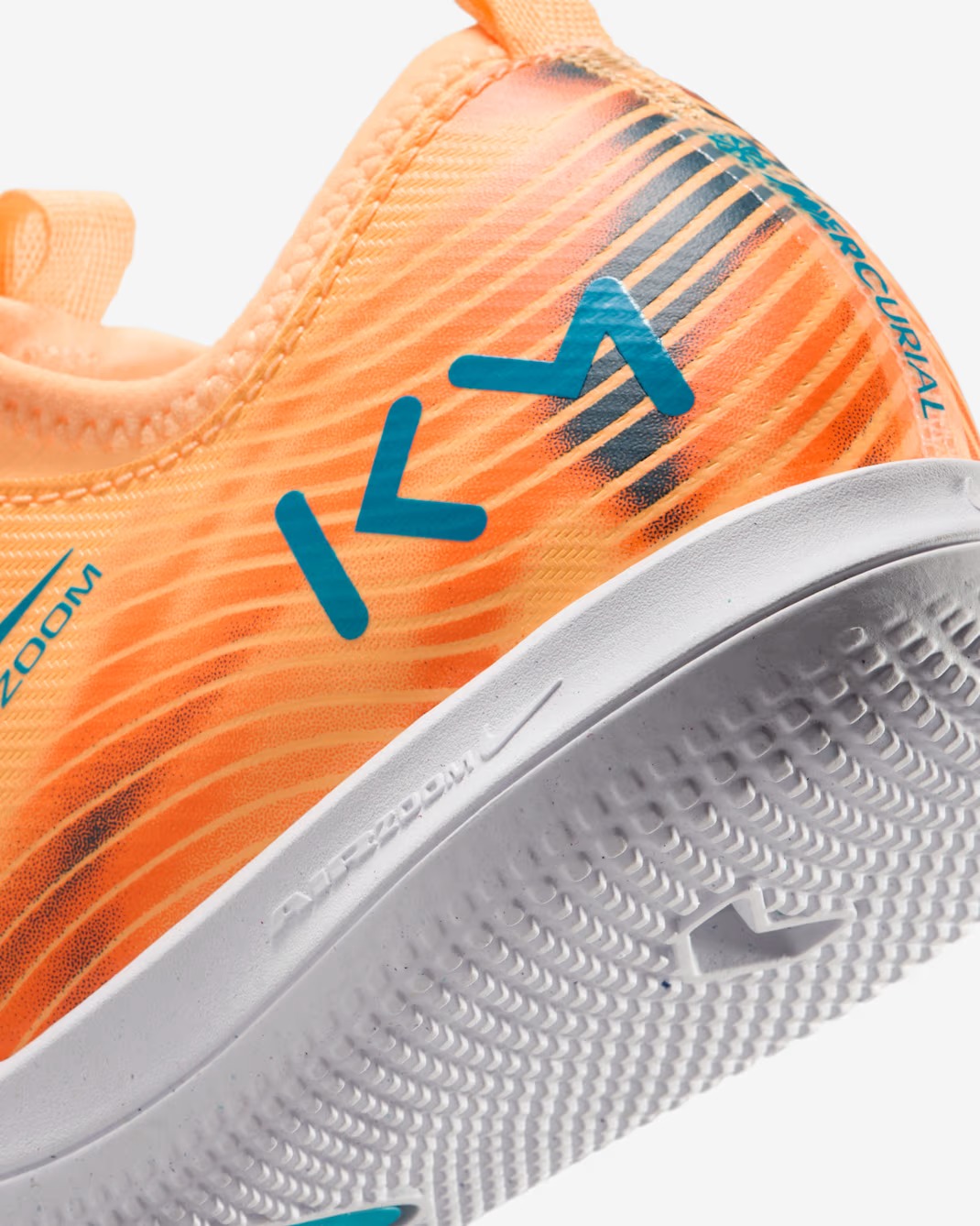 NIKE JR ZOOM VAPOR 16 ACADEMY KM IC MELON TINT/IGLOO/NEO TURQUOISE